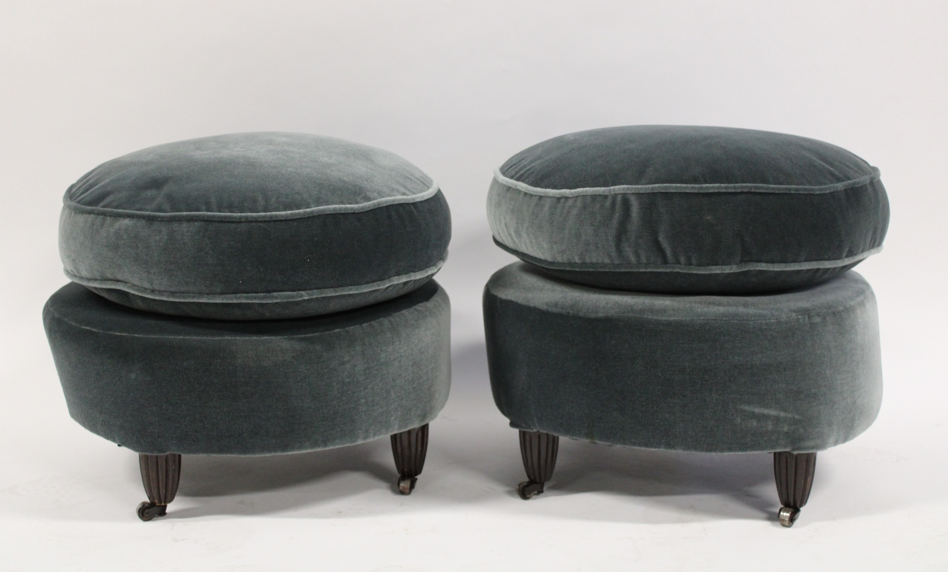 A MIDCENTURY PAIR OF UPHOLSTERED