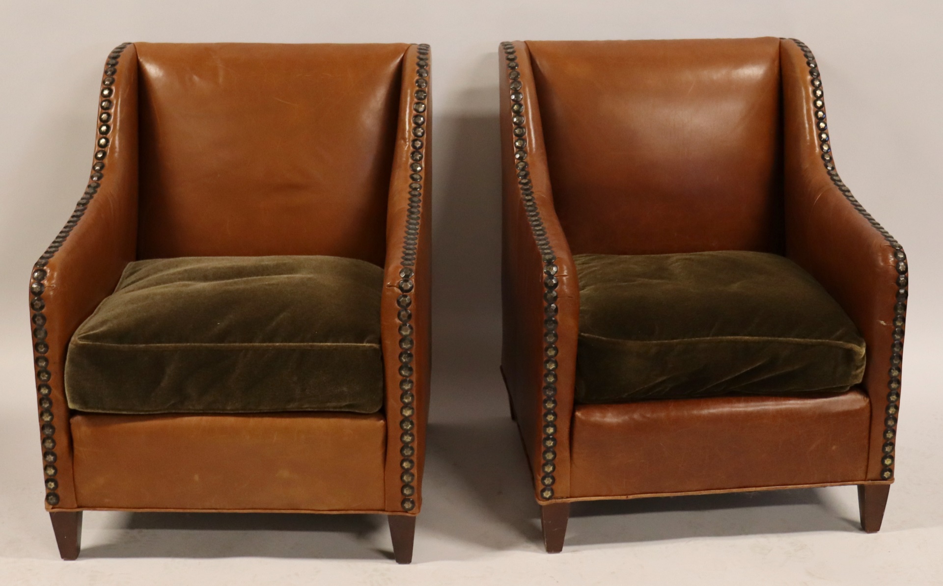 A VINTAGE PAIR OF LEATHER UPHOLSTERED 3b8d7c