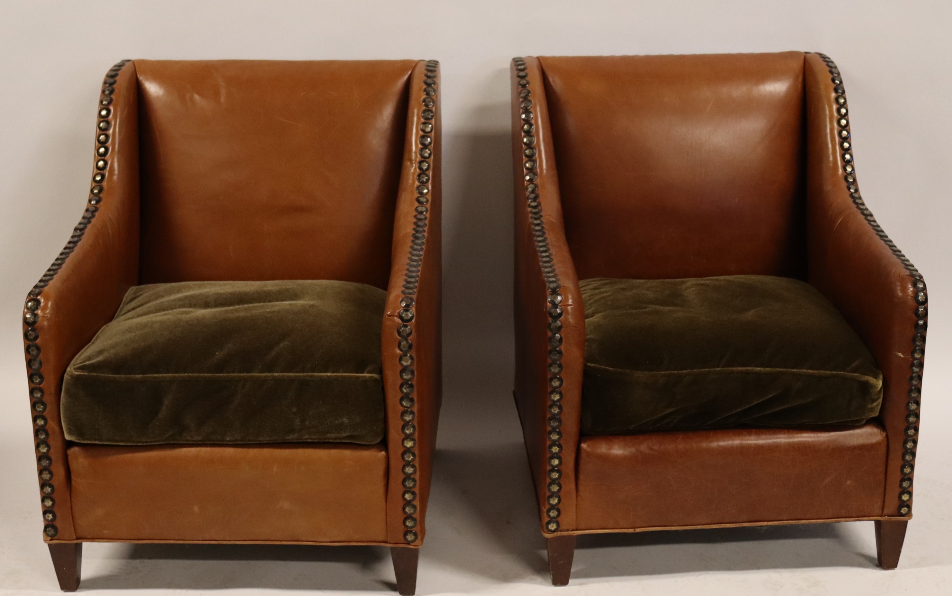 A VINTAGE PAIR OF LEATHER UPHOLSTERED 3b8d7d