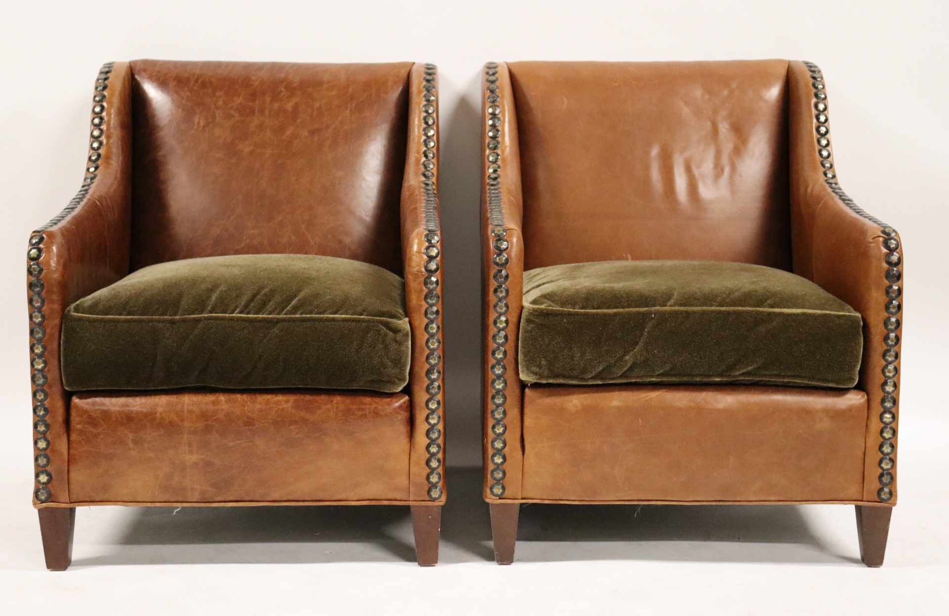 A VINTAGE PR OF LEATHER UPHOLSTERED 3b8d7e