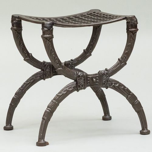 POLISHED IRON CURULE-FORM STOOL17