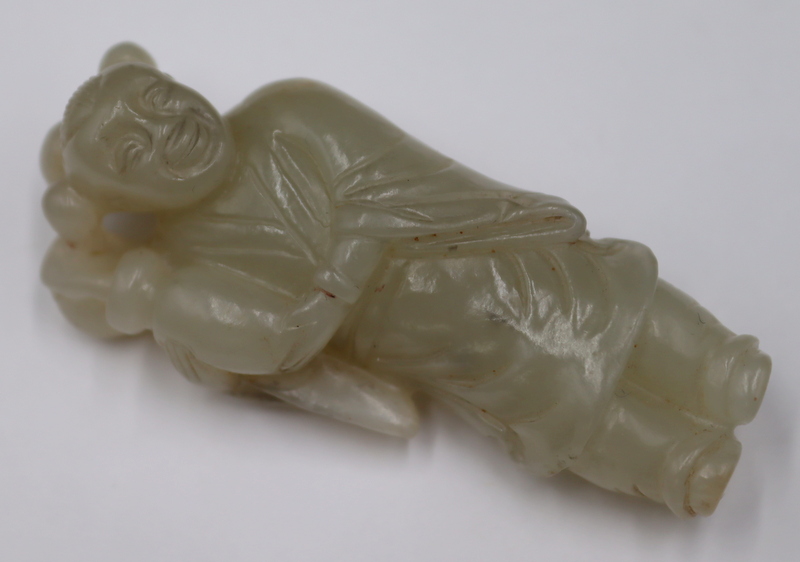 CHINESE CARVED JADE STANDING FIGURE.