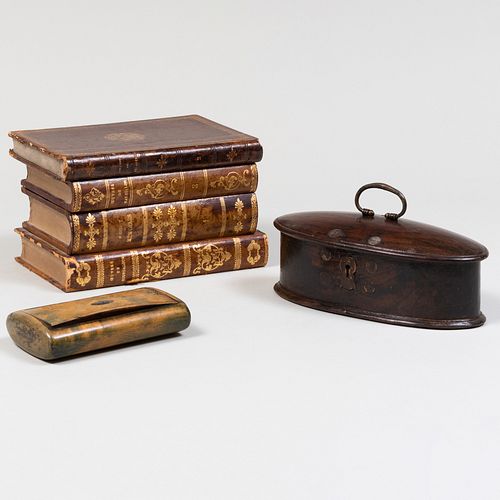 LEATHER WRAPPED BOOK FORM TANTALUS