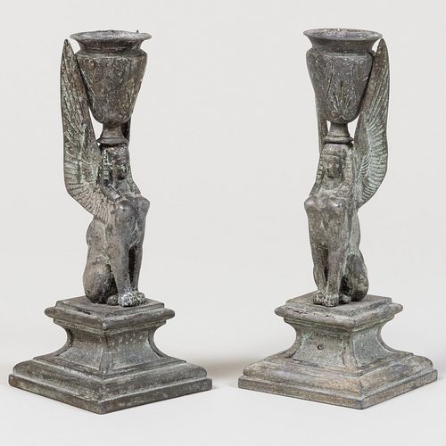 PAIR OF PATINATED METAL SPHINX