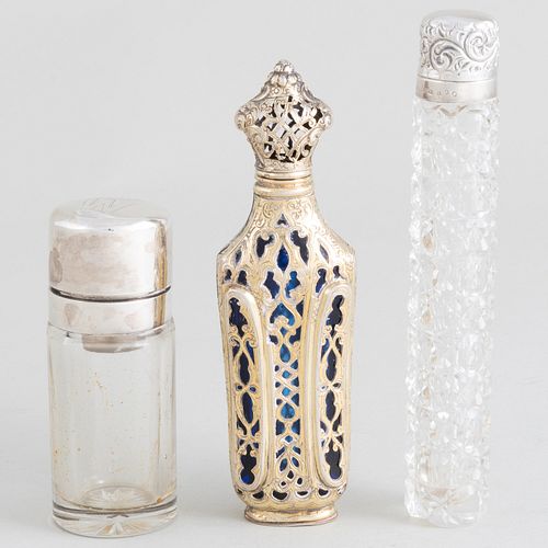 THREE SILVER MOUNTED SCENT BOTTLESComprising:

A