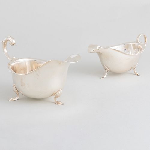 TWO SILVER SAUCE BOATSComprising:

An