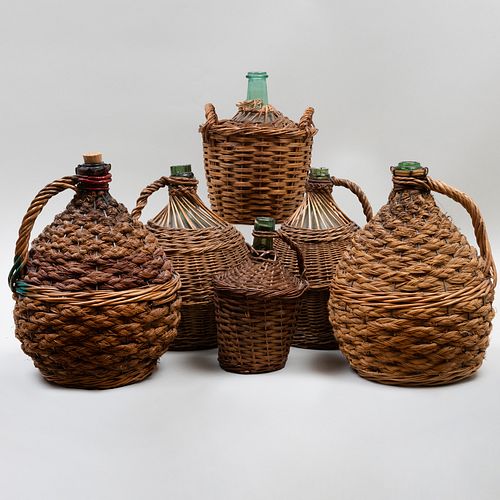 GROUP OF FIVE WICKER MOUNTED GLASS