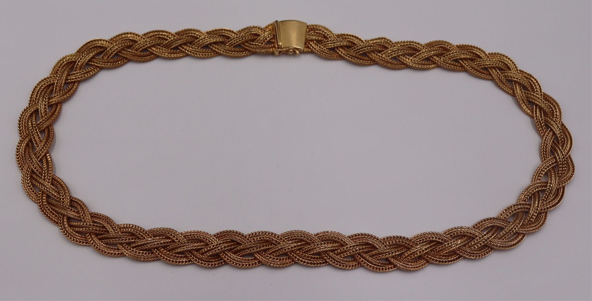 JEWELRY. 18KT GOLD BRAIDED CHAIN