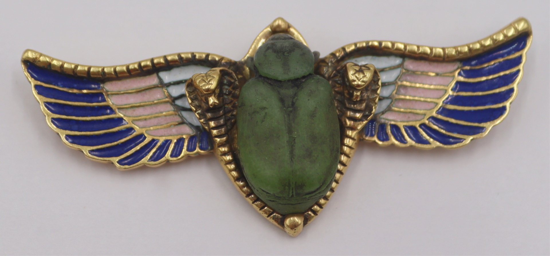 JEWELRY. EGYPTIAN REVIVAL WINGED