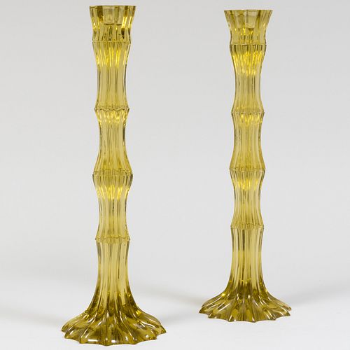 PAIR OF YELLOW GLASS TALL CANDLESTICKSUnmarked.

18