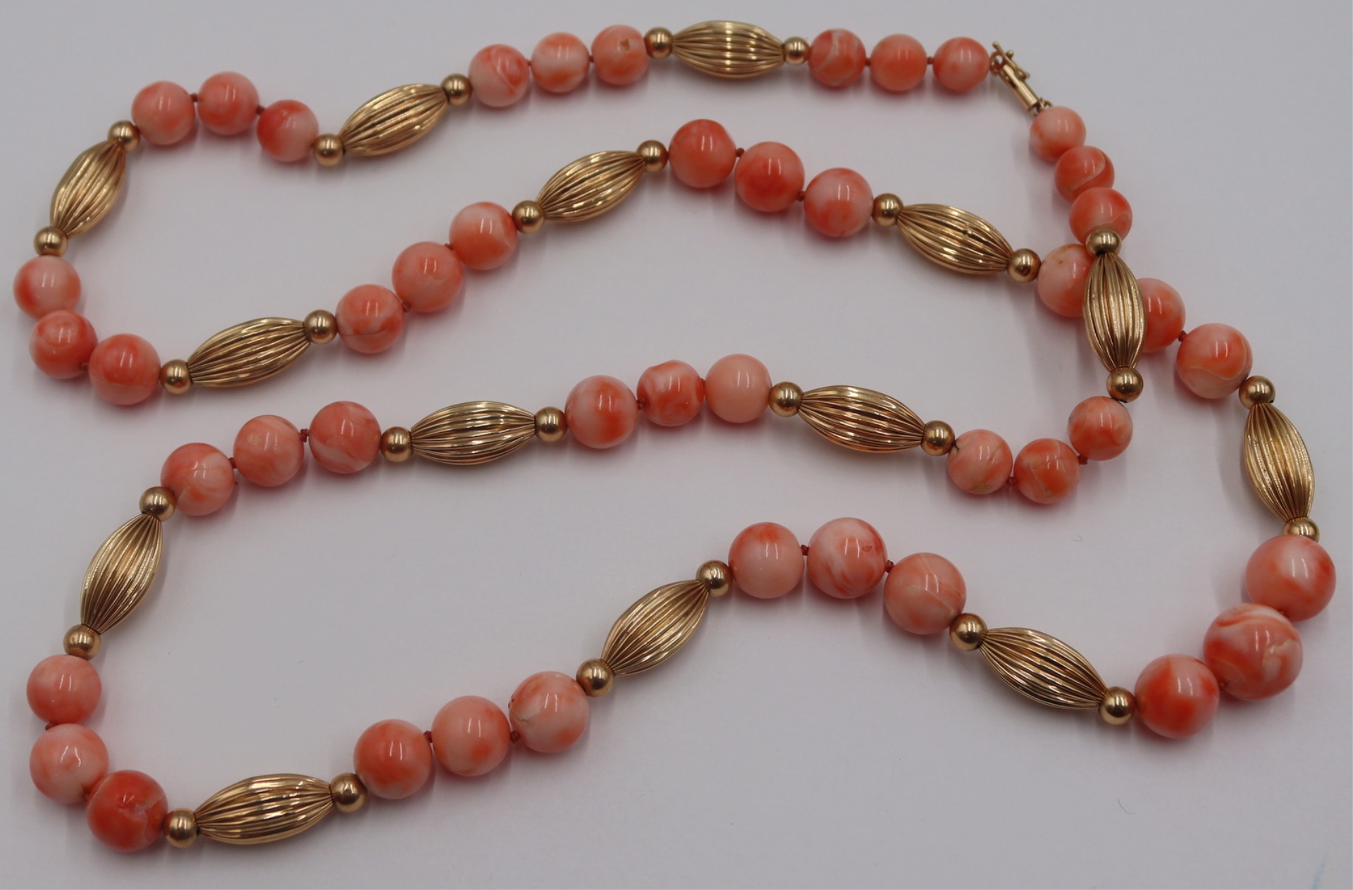 JEWELRY. CORAL AND 14KT GOLD BEADED