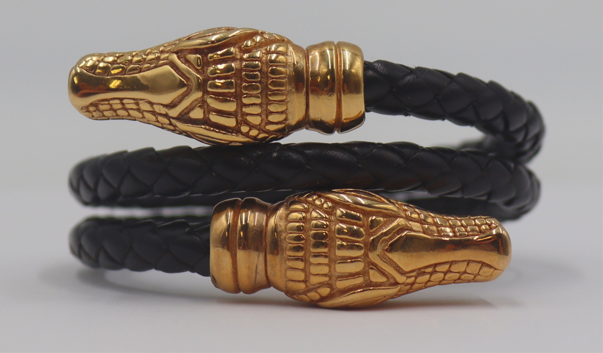 JEWELRY. OTC 18KT GOLD AND LEATHER WRAP