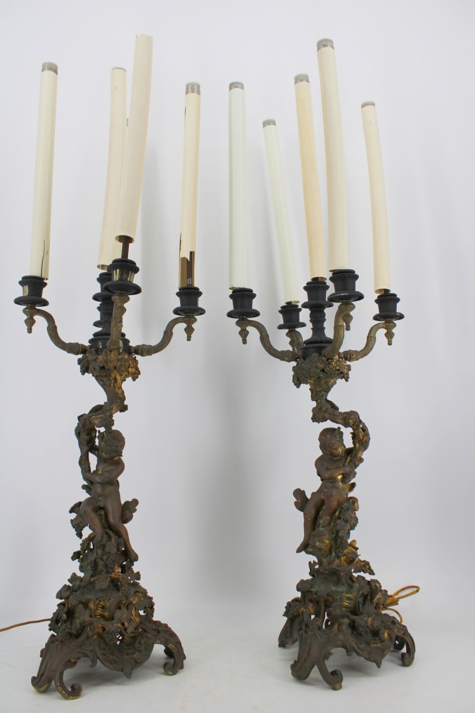 AN ANTIQUE PAIR OF ROCOCO BRONZE