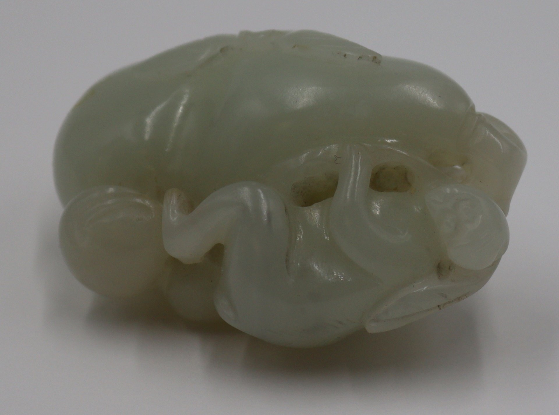 JADE CARVING OF A GOURD AND MONKEY  3bc44d