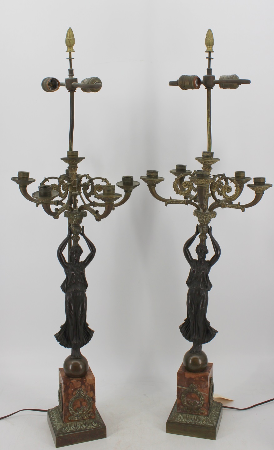 AN ANTIQUE PAIR OF PATINATED &