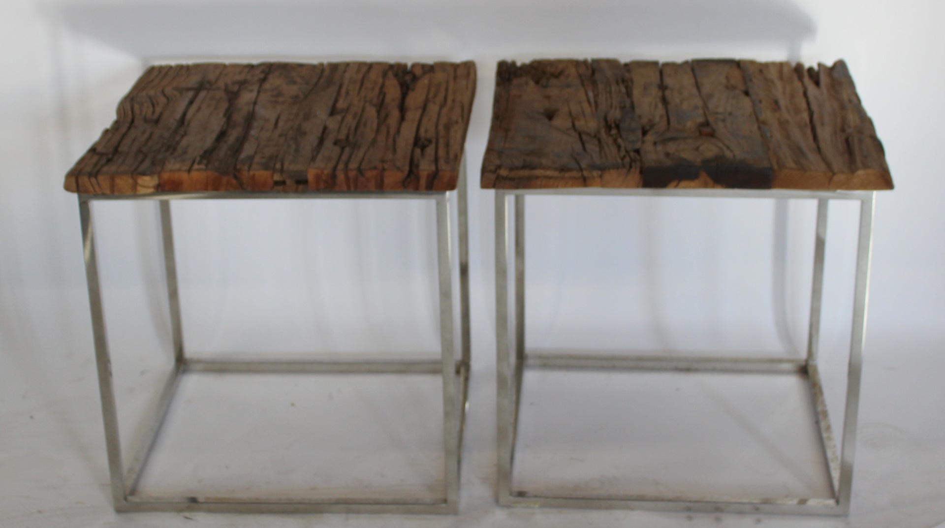 A VINTAGE PAIR OF CHROME TABLES