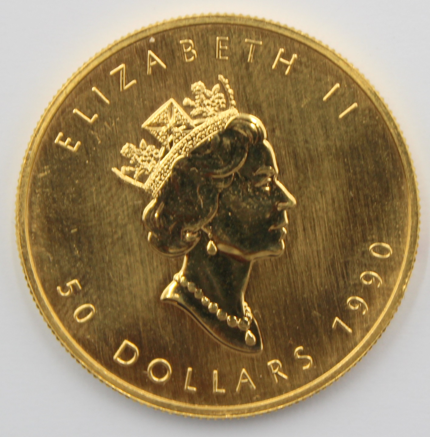 BULLION. 1990 $50 1OZ GOLD CANADIAN