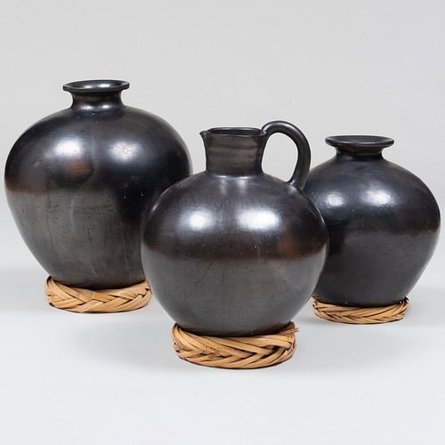 GROUP OF THREE BLACK BURNISHED 3bc824