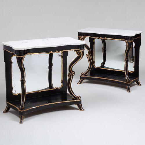 PAIR OF ITALIAN EBONIZED AND PARCEL-GILT