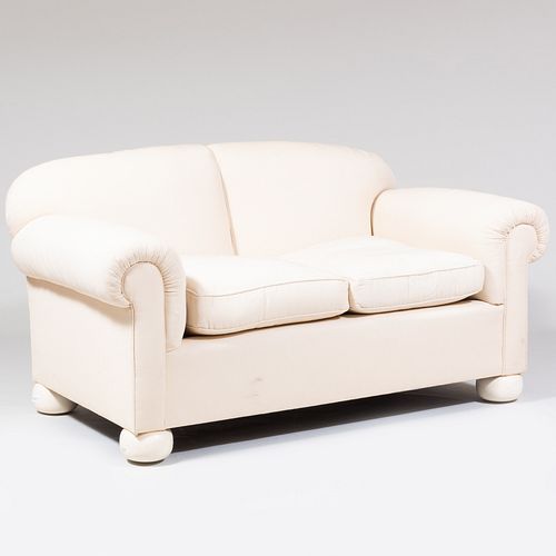CREAM UPHOLSTERED TWO SEAT SOFA