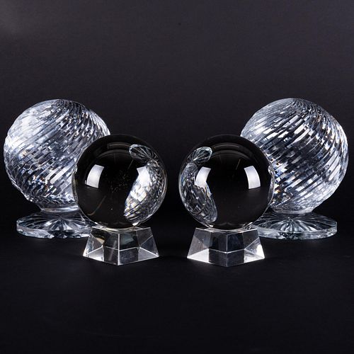 TWO PAIRS OF GLASS SPHERES ON STANDSThe