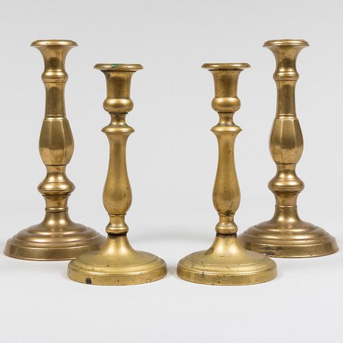 TWO PAIRS OF ENGLISH BRASS CANDLESTICKSThe 3bc8d6