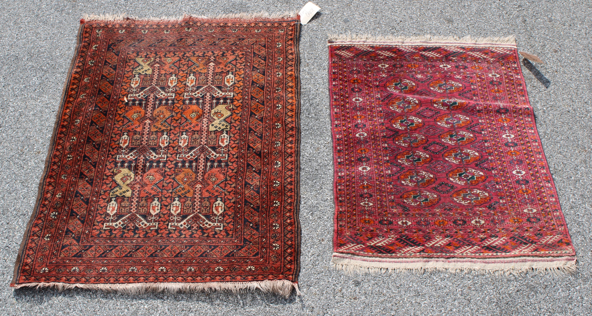 2 ANTIQUE BOKHARA STYLE AREA CARPETS.