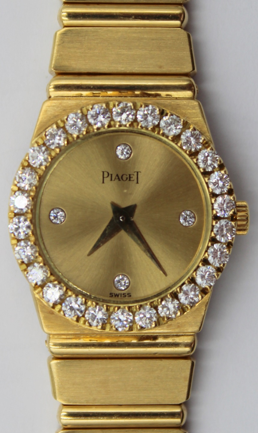 JEWELRY. LADY'S PIAGET POLO 18KT