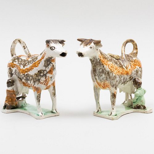 PAIR OF LEEDS TYPE COW CREAMERSUnmarked.

5