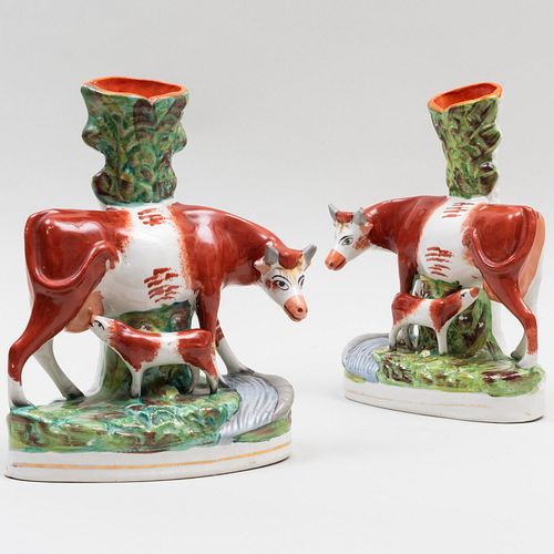 PAIR OF STAFFORDSHIRE COW GROUP