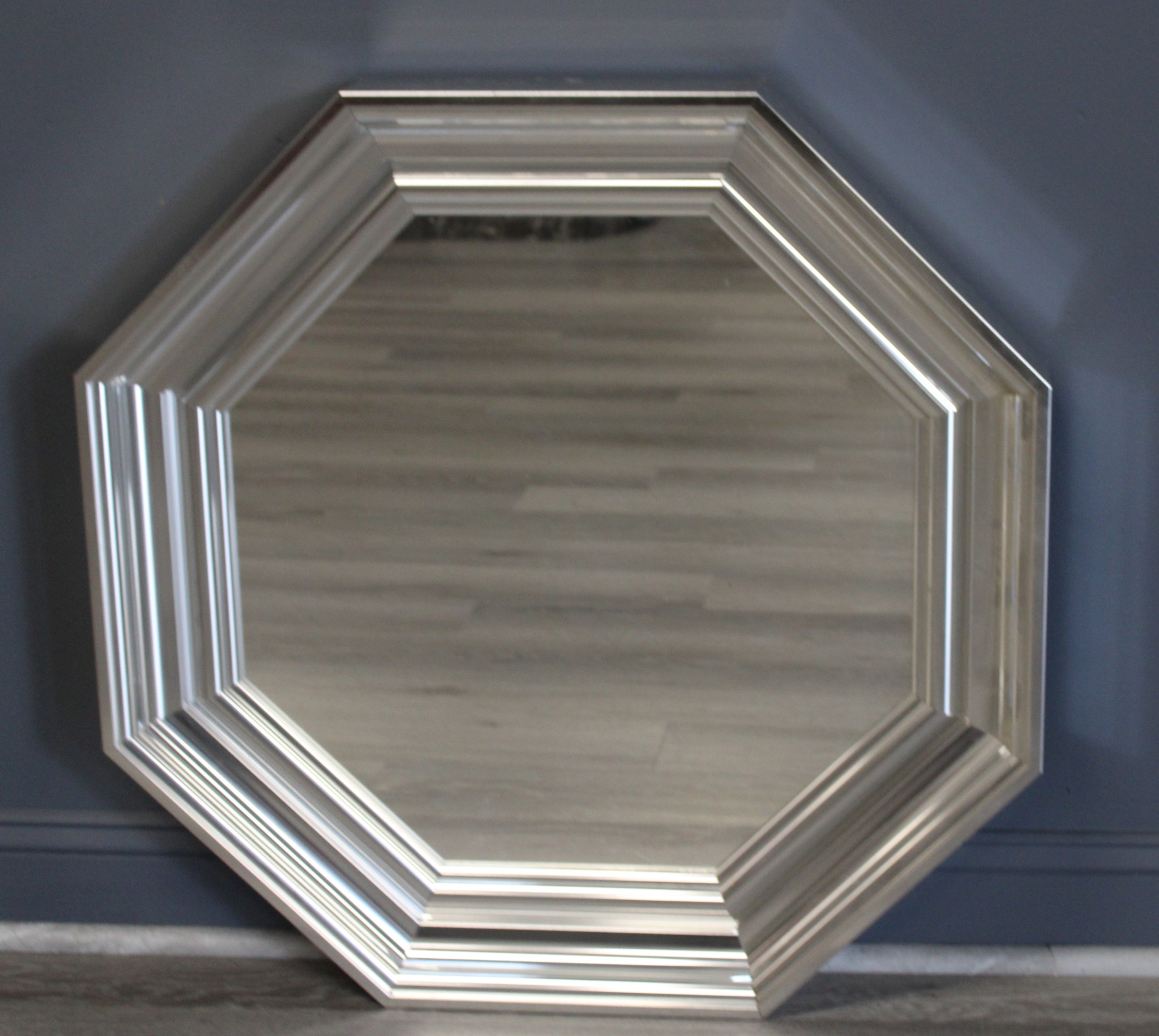 A VINTAGE POLISHED STEEL OR TIN