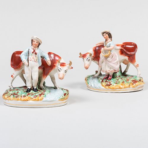 PAIR OF STAFFORDSHIRE MILKING GROUPSUnmarked.

9
