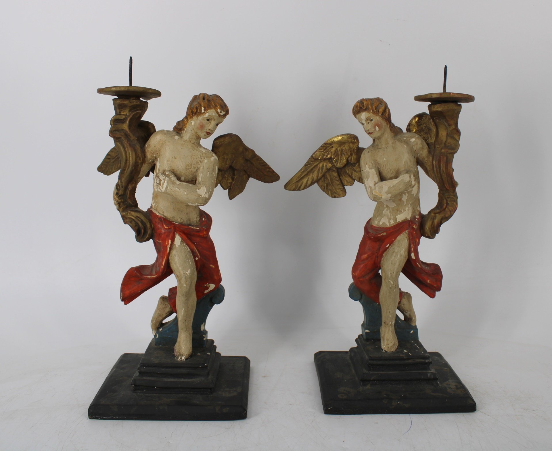 AN ANTIQUE PAIR OF CARVED & POLYCHROME