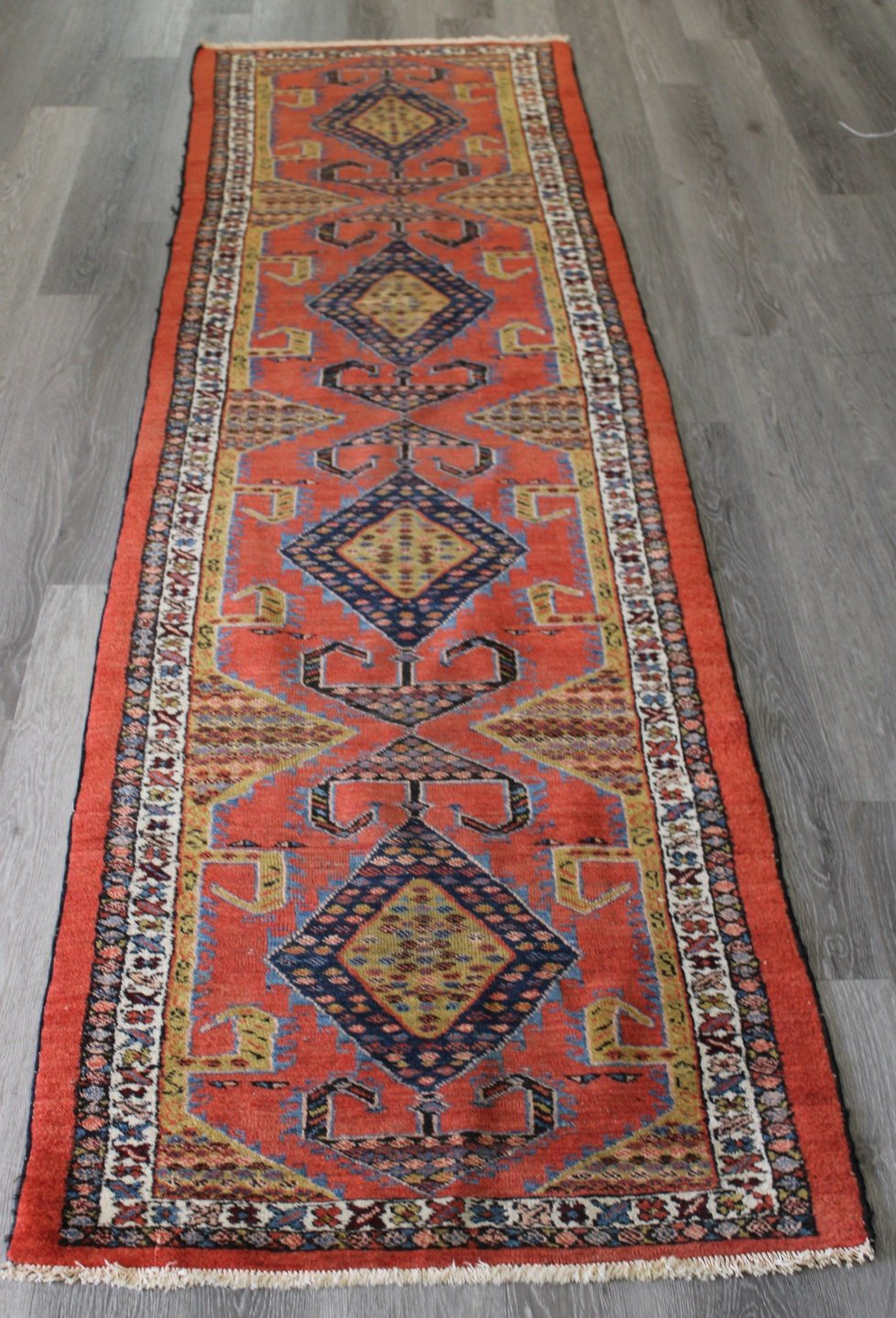 ANTIQUE AND FINELY HAND WOVEN RUNNER.