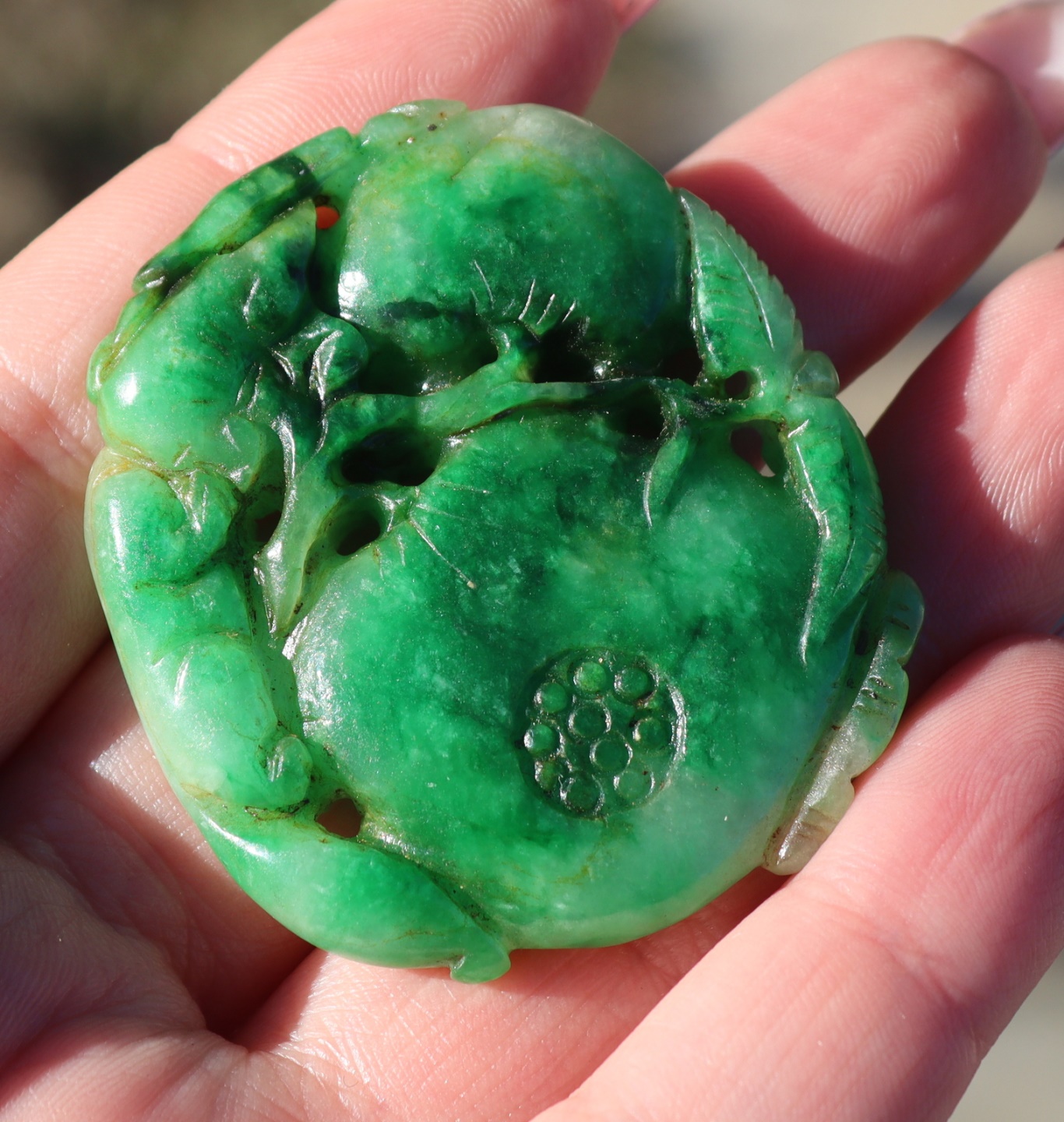 CARVED FIGURAL JADE PENDANT. Carved