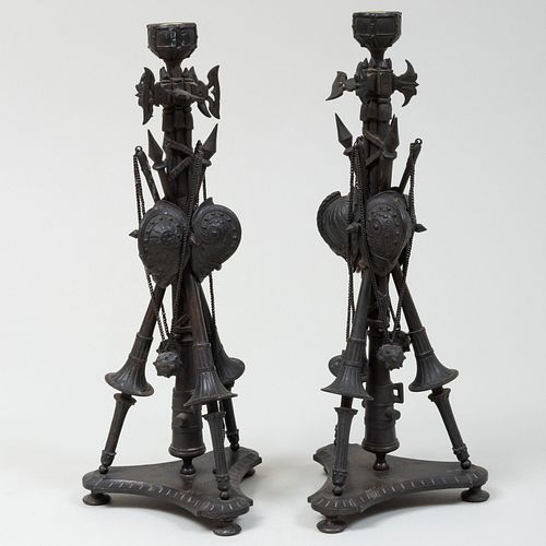 PAIR OF METAL TROPHY FORM CANDLESTICKS13 3baf13