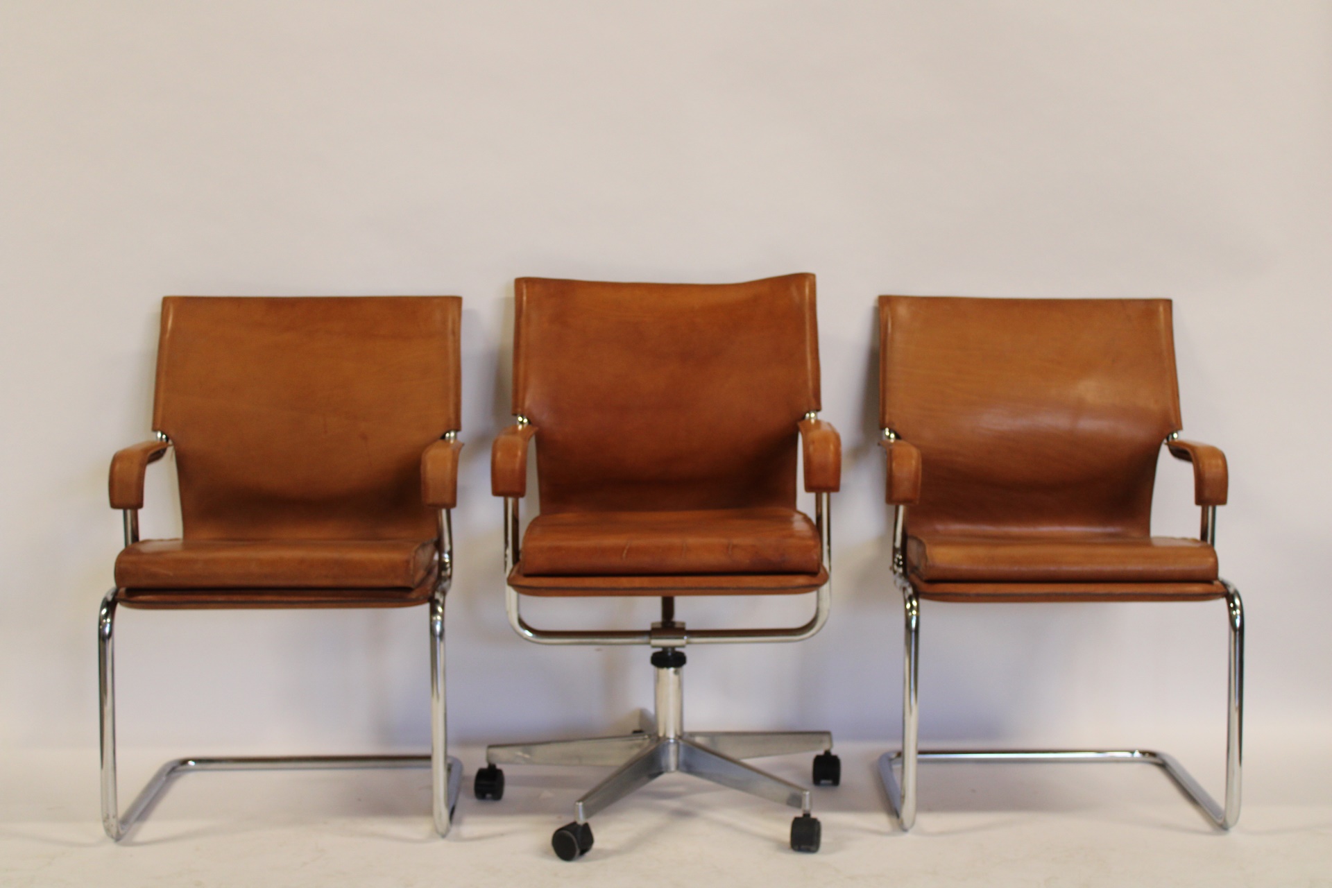 3 MIDCENTURY CHROME AND TAN LEATHER