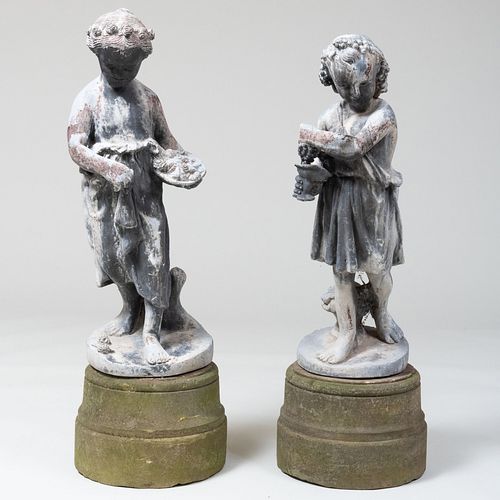 TWO LEAD GARDEN FIGURES ON COMPOSITION 3bb15a