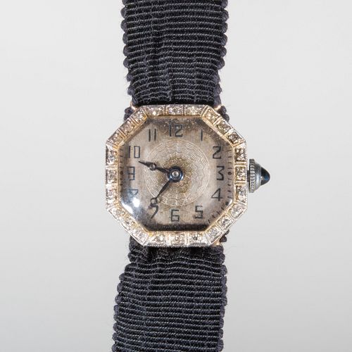 14K WHITE GOLD AND DIAMOND WRISTWATCHOrnately