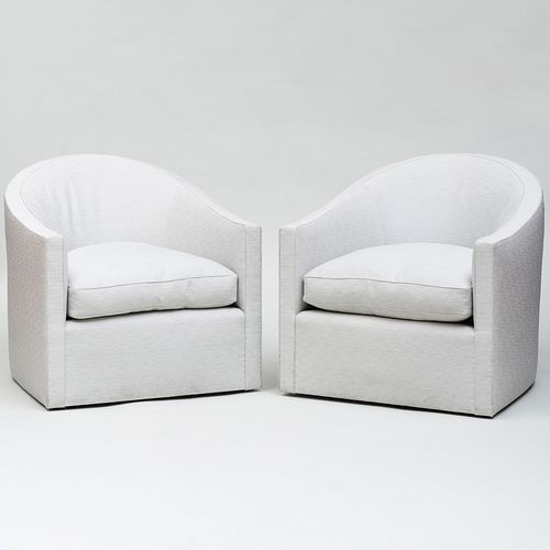 PAIR OF PALE GREY UPHOLSTERED SWIVEL