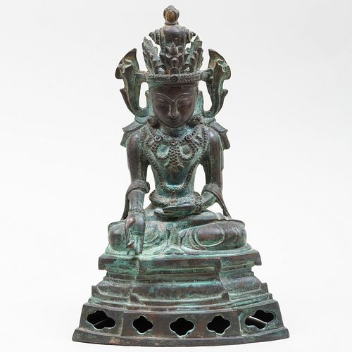 BRONZE SEATED FIGURE OF SEATED