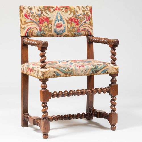 HENRI IV CARVED WALNUT ARMCHAIRWith