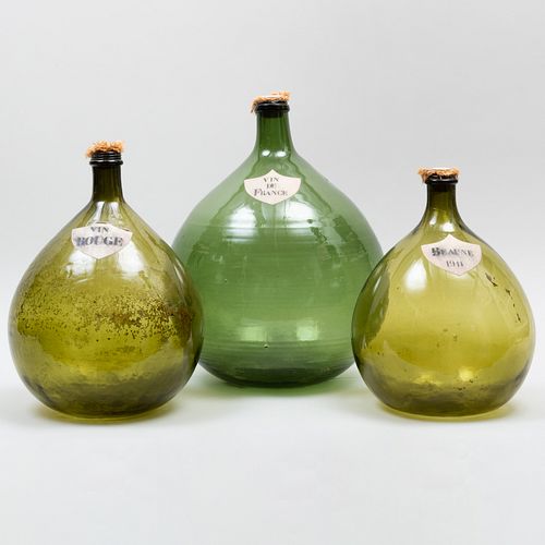 THREE LARGE FRENCH GLASS WINE DEMIJOHNSWith