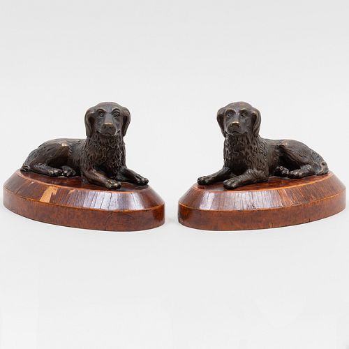 PAIR OF CAST METAL RECUMBENT DOGS 3bb8e4