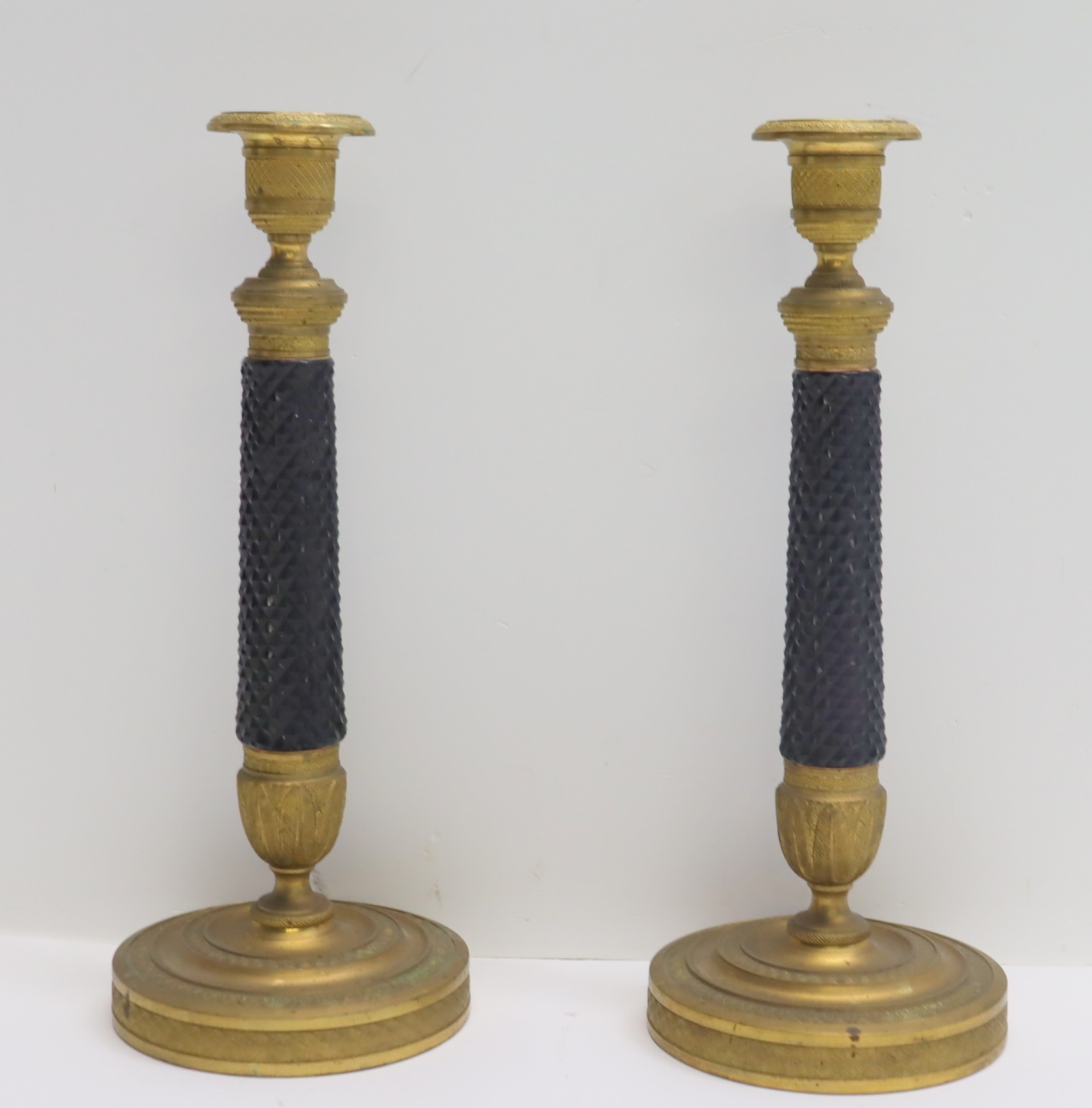 AN ANTIQUE PAIR OF GILT BRONZE & CUT