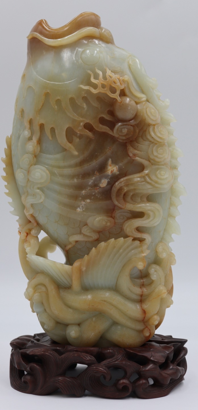 RUSSET JADE CARVING OF A JUMPING