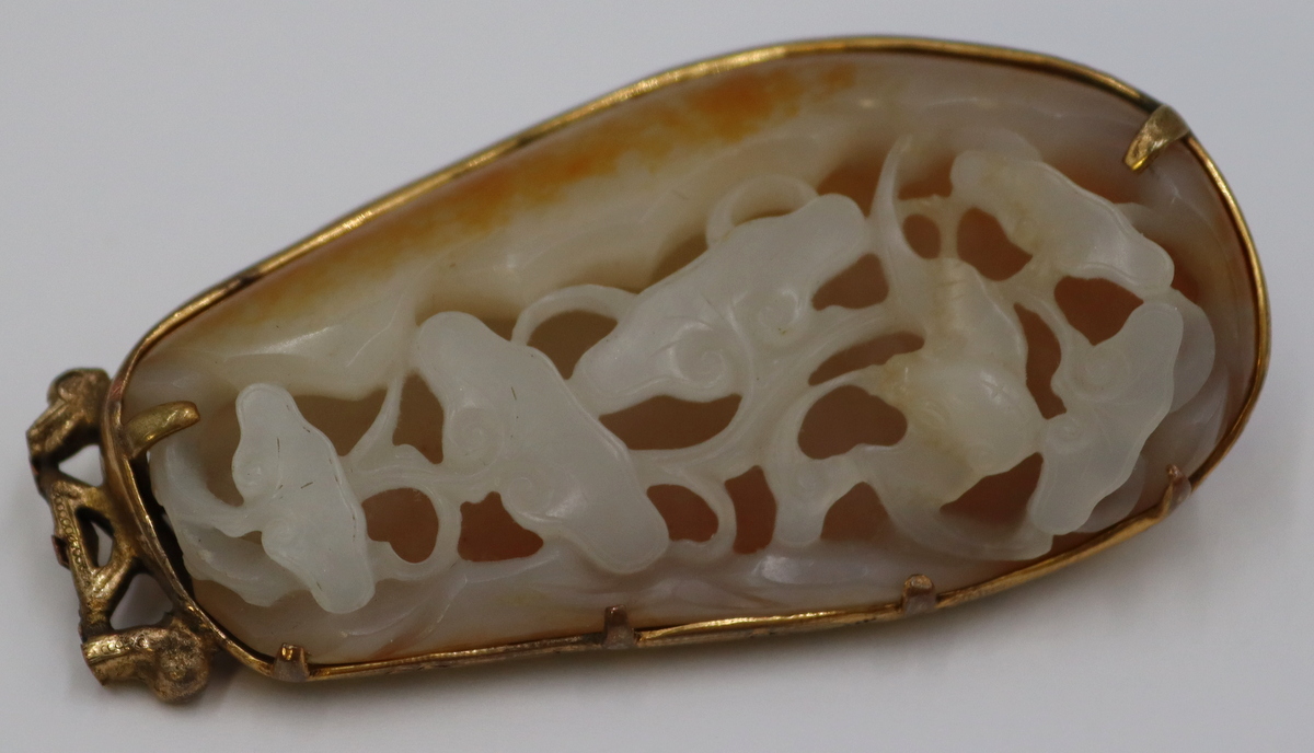 CARVED RUSSET JADE PENDANT WITH