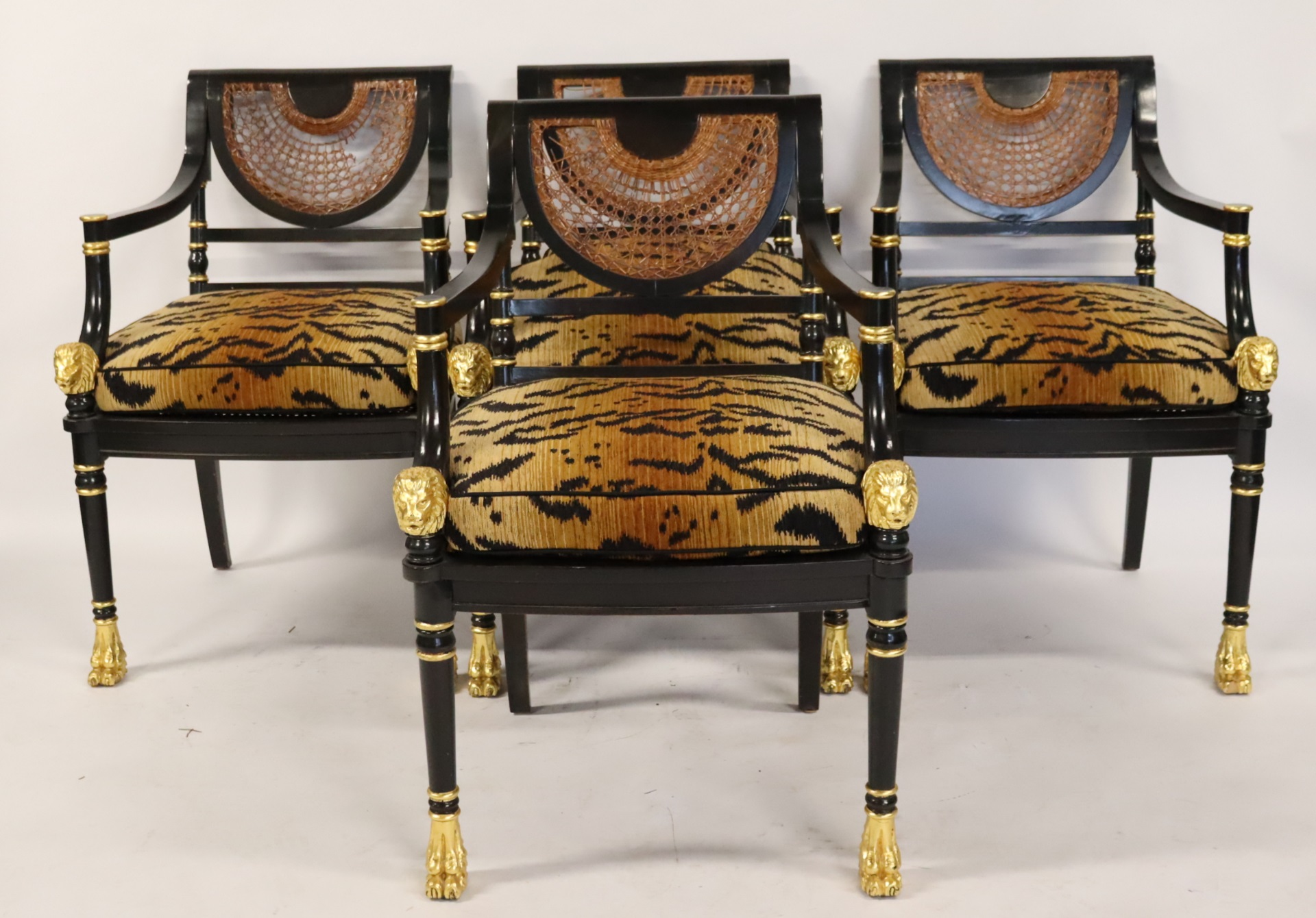 4 CARVED, EBONIZED AND GILT DECORATED