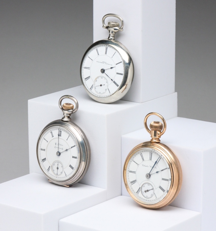 THREE COLUMBUS TRANSITION POCKET WATCHES.