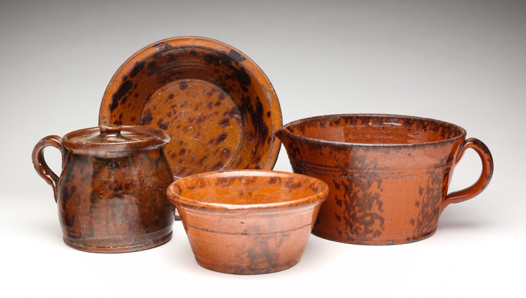 FOUR PIECES OF AMERICAN REDWARE.